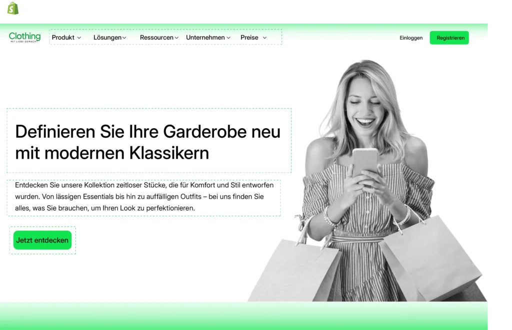 Shopify-Website einer Modefirma. Eine lächelnde Frau im gestreiften Kleid hält Einkaufstaschen und schaut auf ihr Smartphone. Links neben ihr steht der Text: 'Definieren Sie Ihre Garderobe neu mit modernen Klassikern' und eine Beschreibung der Kollektion. Darunter befindet sich ein grüner Button mit der Aufschrift 'Jetzt entdecken'. Im oberen Bereich der Seite ist das Menü mit Optionen wie Produkt, Lösungen und Ressourcen sichtbar